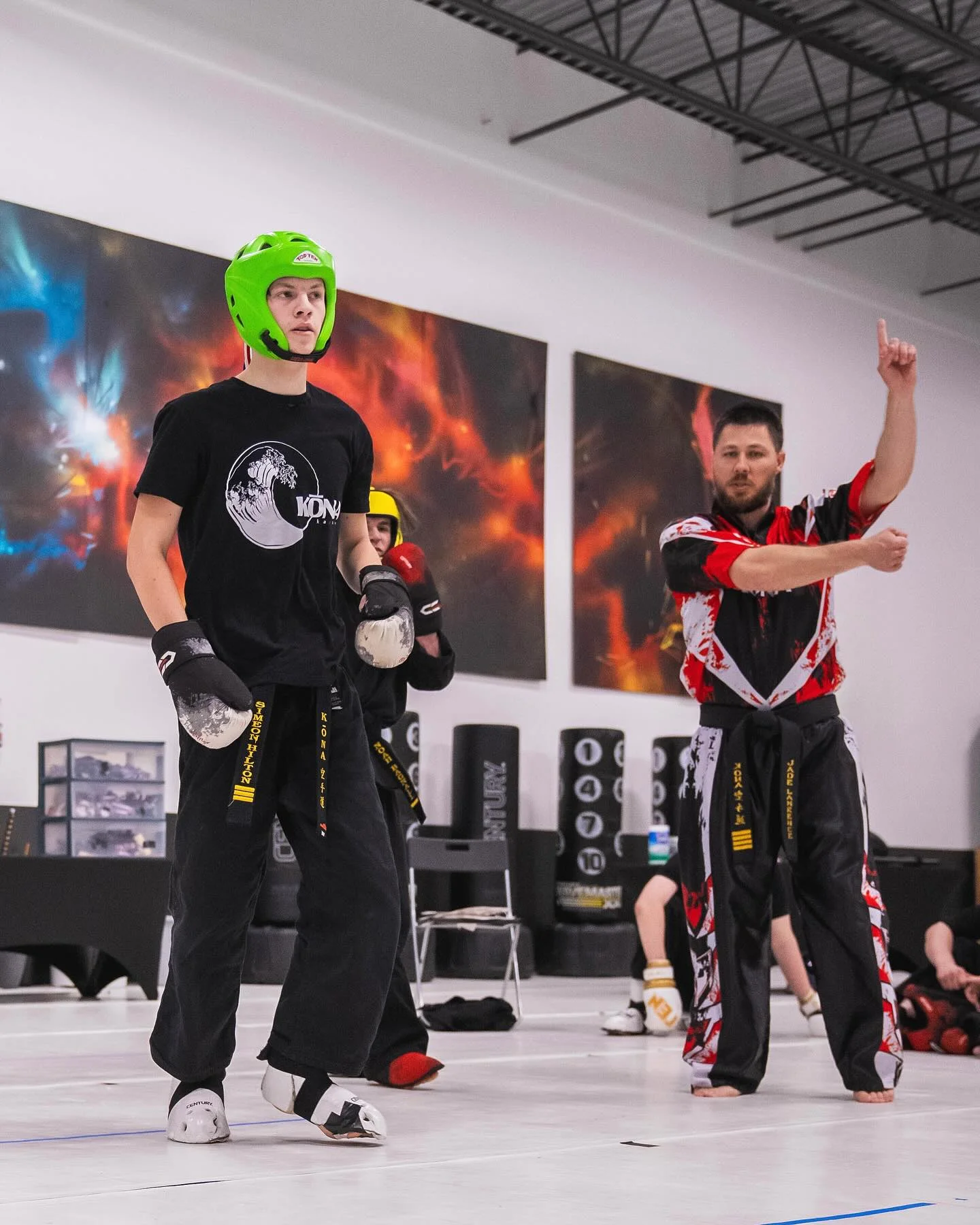 adult karate students working through partner drills at Kona Karate