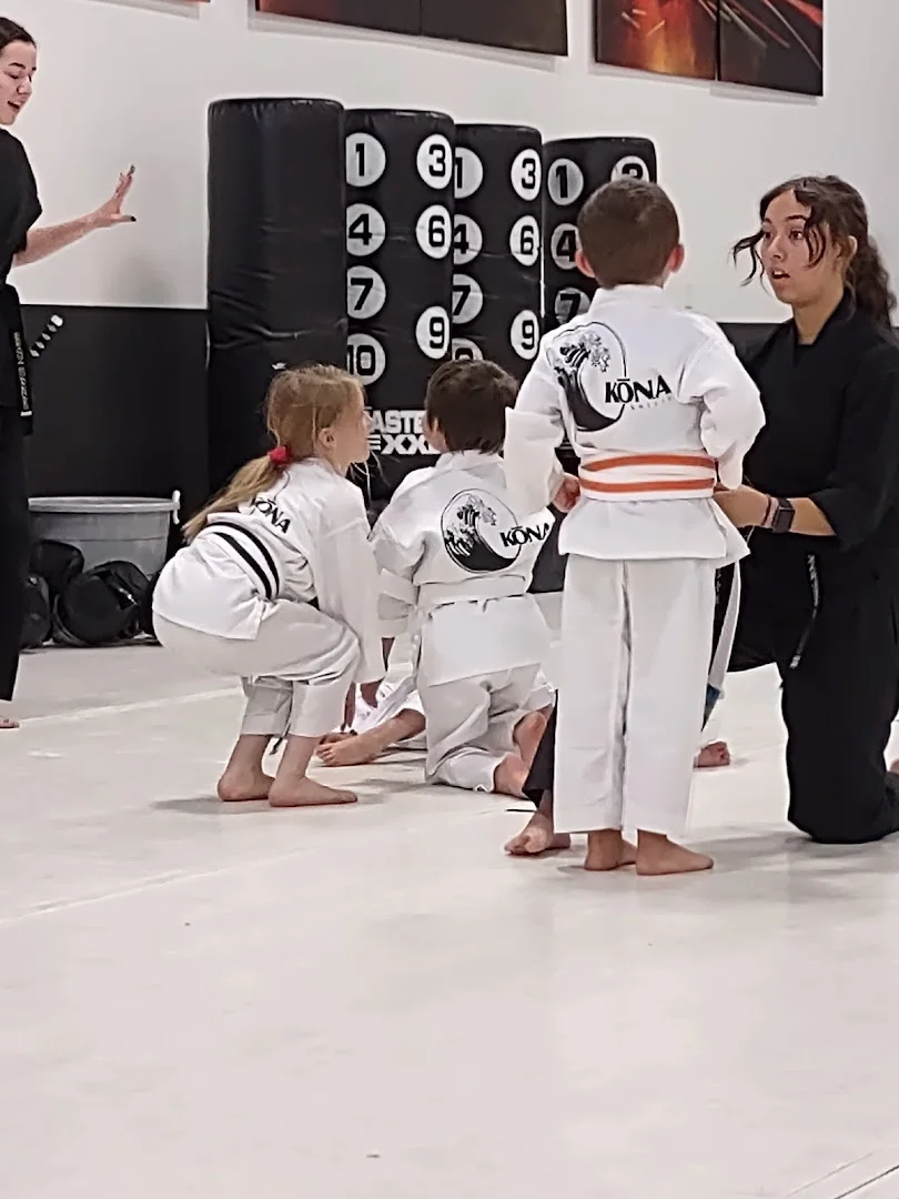 A preschool student concentrating during a drill at Kona Karate